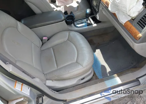 1999 Lincoln Continental из США, поврежденный, VIN 1LNHM97V5XY630004